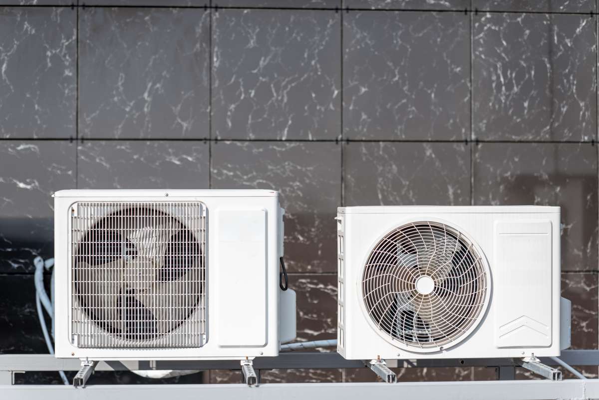 two outdoor units of the air conditioner placed outside